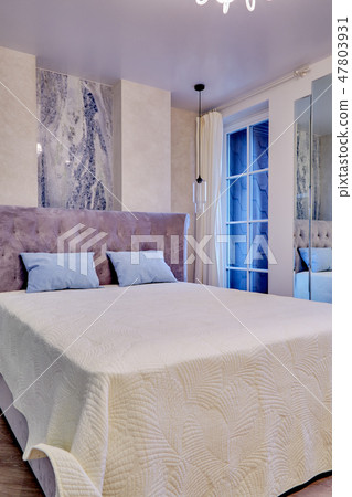 Big comfortable double bed in elegant luxary bedroom Big comfortable double bed in elegant luxary bedroom 47803931