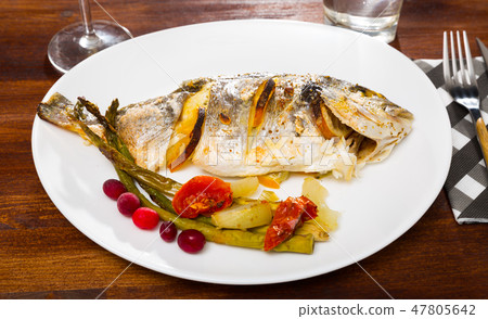 Sea bream baked in oven Sea bream baked in oven 47805642
