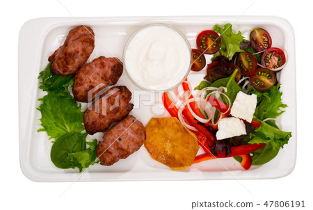 Kebets with tomatoes and peppers is tasty dish of Bulgarian cuisine Kebets with tomatoes and peppers is tasty dish of Bulgarian cuisine 47806191