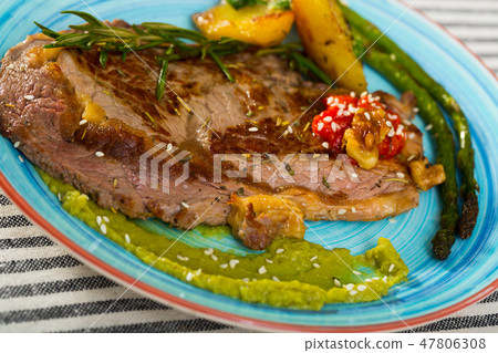 Photography of plate with baked veal with vegetables 47806308
