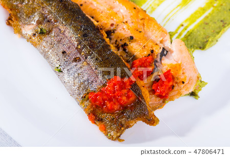 Roasted trout fillet with sauces 47806471
