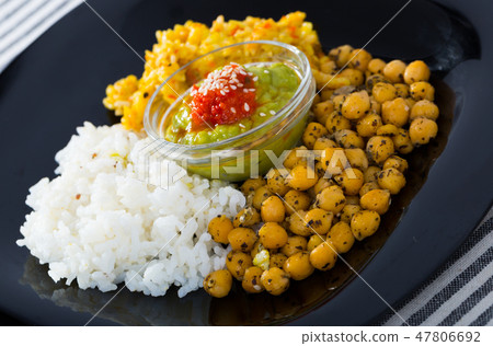 Chickpeas with rices and sauces Chickpeas with rices and sauces 47806692