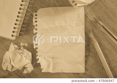Crumpled pages and notebook 47806847