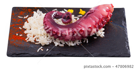 Octopus with rice served with paprika Octopus with rice served with paprika 47806982