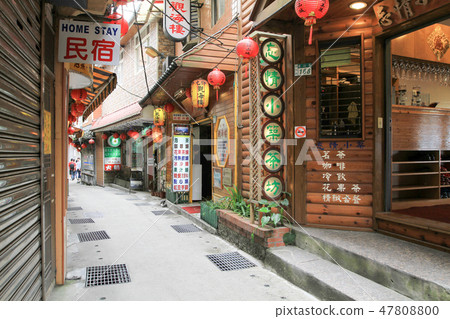 seen walking through the Jiufen old street seen walking through the Jiufen old street 47808800