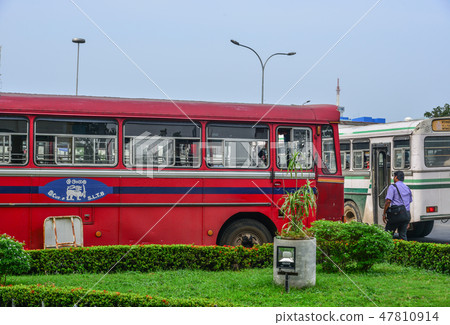 People and vehicles at main bus station People and vehicles at main bus station 47810914