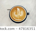 Cup of coffee with latte art - Rosetta. 47816351