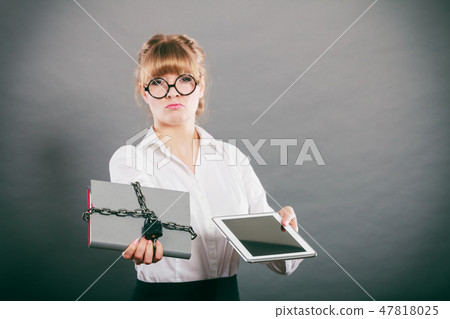 Woman with document and tablet. Digital storage. 47818025