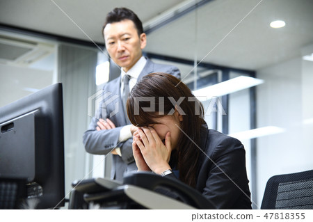 Female office scene grieved by boss scolded Female office scene grieved by boss scolded 47818355