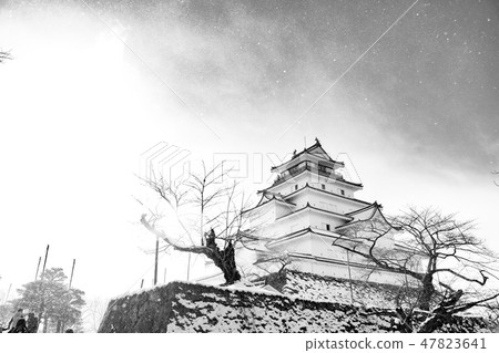 Japanese castle on snowfall day Japanese castle on snowfall day 47823641