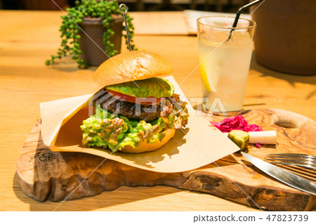 Cafe big hamburger and drink 47823739