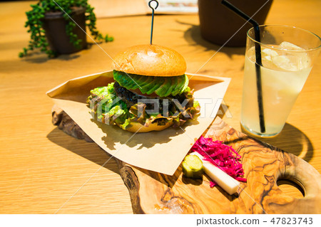 Cafe big hamburger and drink 47823743