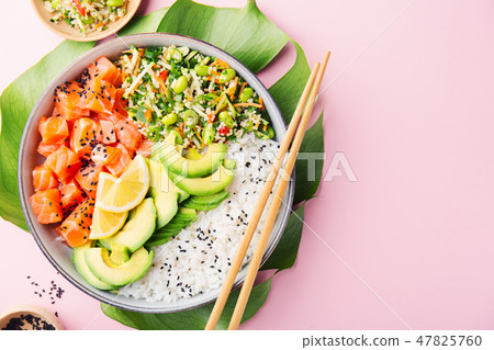 Poke bowl with salmon served in bowl Poke bowl with salmon served in bowl 47825760