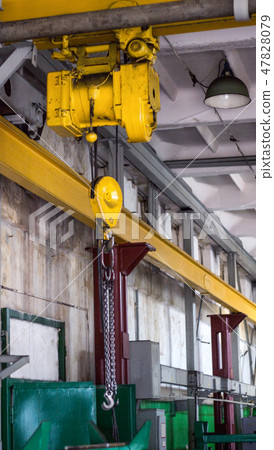 Yellow production crane beam, production crane for lifting cargo, over Yellow production crane beam, production crane for lifting cargo, over 47828079