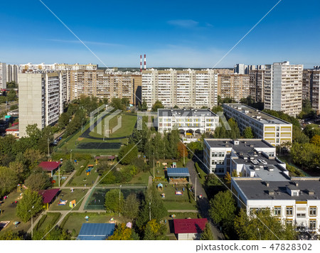 Sleeping area with residential buildings, football field and childrens playgrounds in Moscow, Russia 47828302