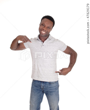 African man standing and pointing to himself African man standing and pointing to himself 47829179