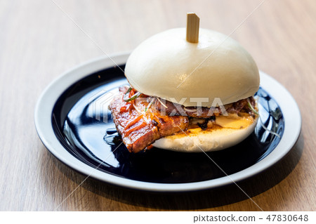 Delicious pork belly bao or Chinese burger 47830648