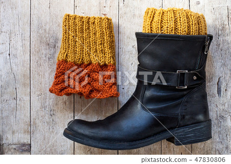 black leather boot and knitted wood legwarmers 47830806