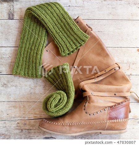 high boot and knitted green wood legwarmers 47830807