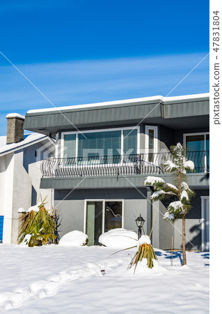 Residential house entrance on bright winter day in Canada 47831804