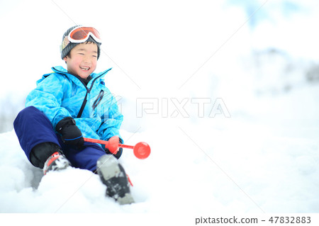 Children enjoying snow 47832883