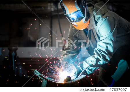 industrial worker welding 47837097