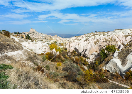View of Utih Saar rocks and townscape from dove valley View of Utih Saar rocks and townscape from dove valley 47838996