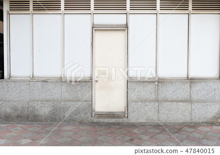 sidewalk by street wall & door 47840015