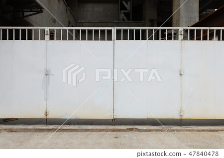 sidewalk by street wall & door sidewalk by street wall & door 47840478