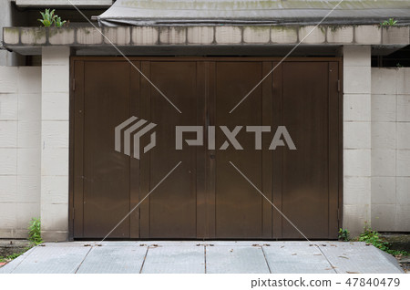 sidewalk by street wall & door sidewalk by street wall & door 47840479