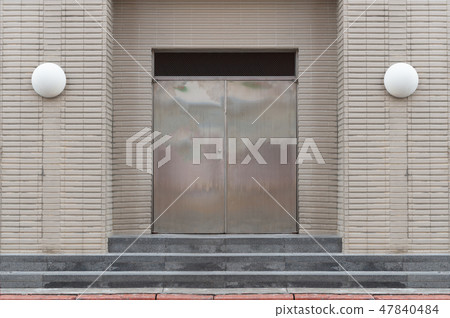 sidewalk by street wall & door sidewalk by street wall & door 47840484