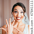 Portrait of pretty laughing bride 47841111