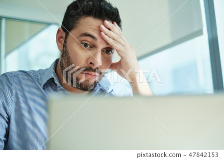 Worried Businessman Got Virus and Data Loss on Laptop Computer Worried Businessman Got Virus and Data Loss on Laptop Computer 47842153