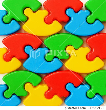 Closeup of colored puzzles 47845930