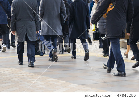 Commuter landscape behind the winter businessman 47849299