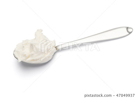 Traditional Mascarpone cheese in spoon isolated on white with clipping path 47849937