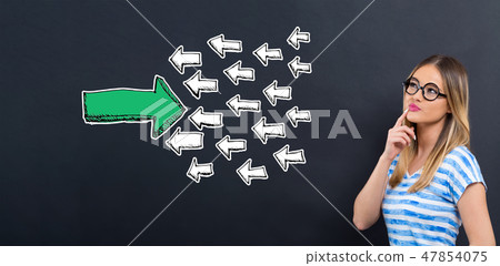 Arrow facing in a opposite direction with young woman Arrow facing in a opposite direction with young woman 47854075