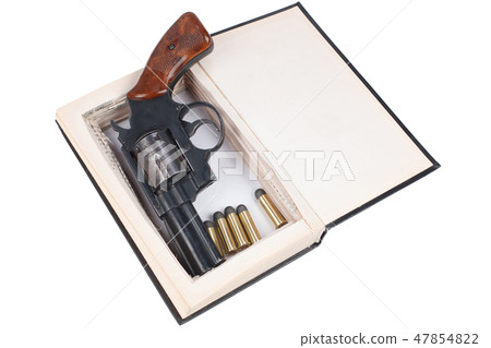 A gun hidden inside a book A gun hidden inside a book 47854822