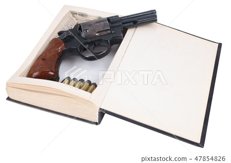 A gun hidden inside a book A gun hidden inside a book 47854826