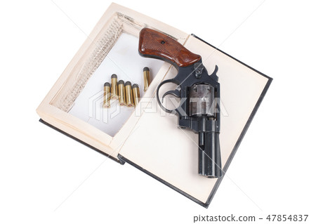 A gun hidden inside a book A gun hidden inside a book 47854837