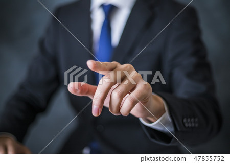 A businessman with a blue tie 47855752