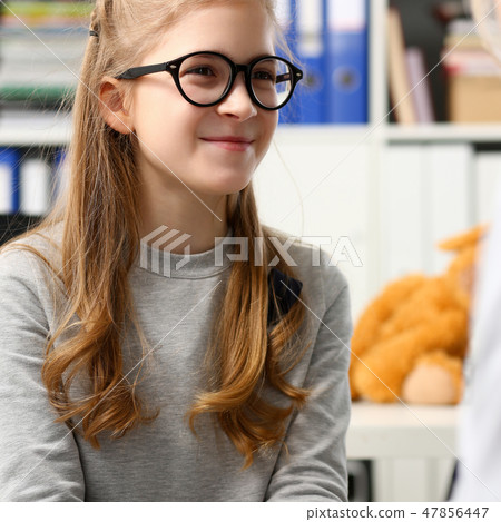 Little child at pediatrician reception Little child at pediatrician reception 47856447