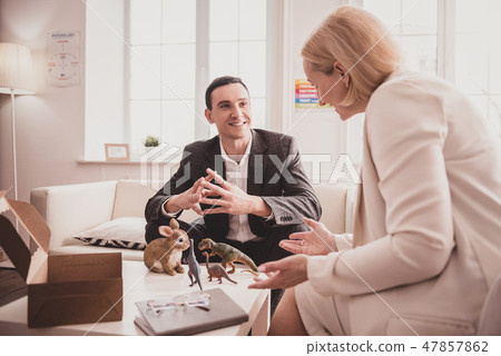 Kind therapist discussing problems at work of her client Kind therapist discussing problems at work of her client 47857862