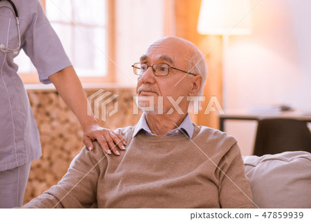 Upset bearded man being deep in thoughts 47859939