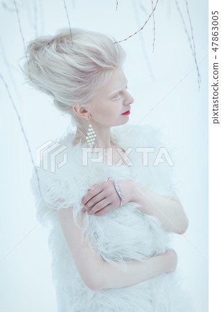 beautiful albino young woman girl with red lips 47863005