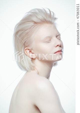 beautiful albino ypung woman on white background beautiful albino ypung woman on white background 47863011