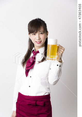 A woman with a beer mug A woman with a beer mug 47863408