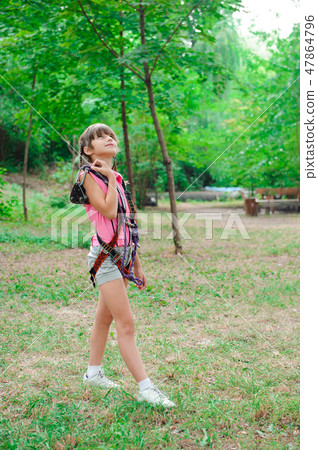 adventure climbing high wire park - hiking in the rope park girl adventure climbing high wire park - hiking in the rope park girl 47864796