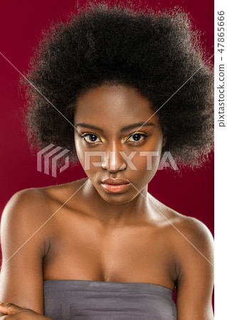 Portrait of a beautiful serious afro American woman Portrait of a beautiful serious afro American woman 47865666
