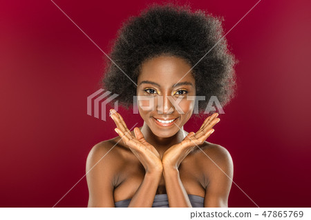 Positive cheerful young woman smiling to you 47865769